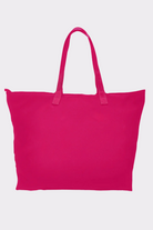 The Urban Slate Waterproof Bag is a spacious, plain, bright pink gym and travel bag with two handles, shown against a light gray background.