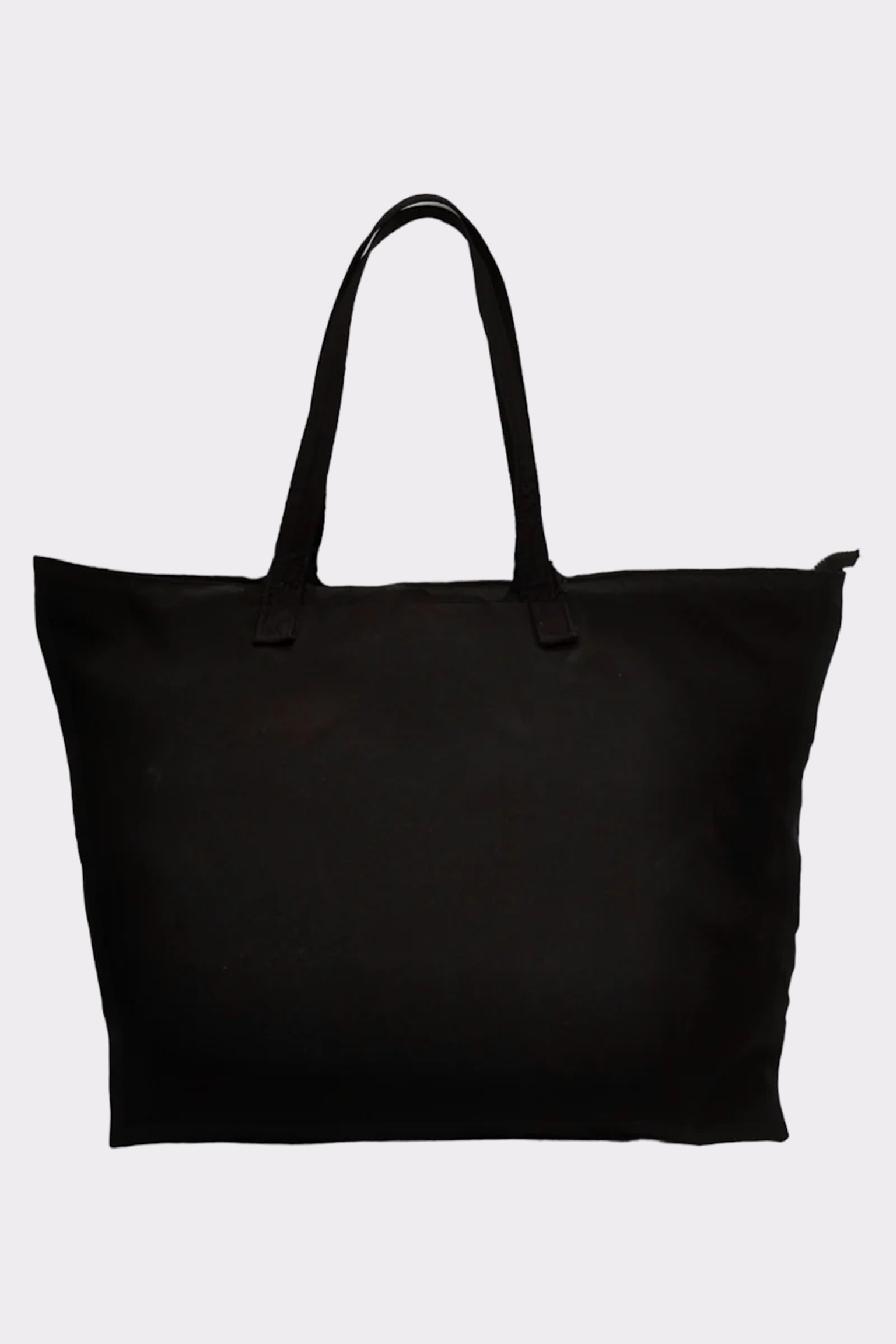 The Urban Slate Waterproof Bag is a large black tote with two handles, crafted from solid waterproof material. Displayed against a light gray background, it’s ideal for sleek gym sessions or travel.