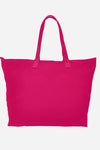 A large, vibrant Barbara Pink waterproof travel bag called "The One" by looselyboho is displayed against a plain white background. The bag features reinforced handles, a simple and unadorned design, and appears spacious.